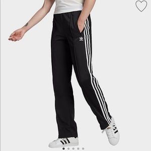 Woman’s Adidas Original Track Pants.